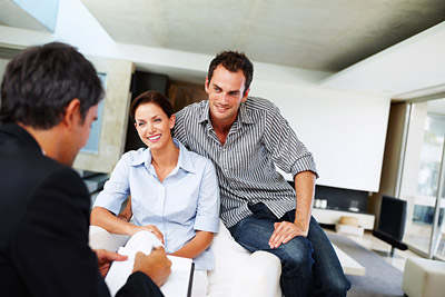 Happy-Young-Couple-Discussing-400